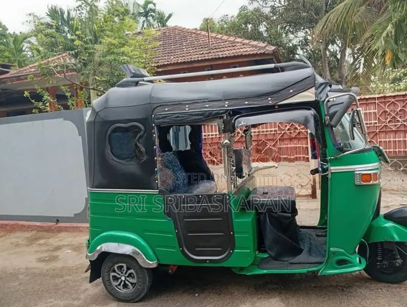 Bajaj RE 2013