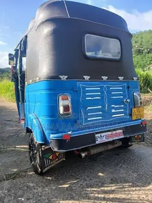 Bajaj RE 2011