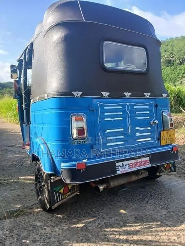 Bajaj RE 2011