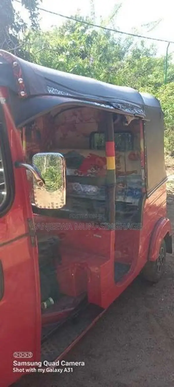 Bajaj RE 2014