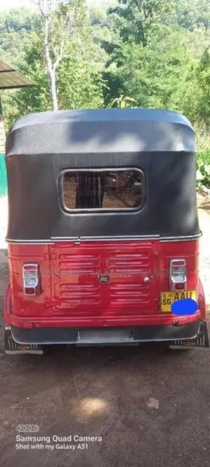 Bajaj RE 2014