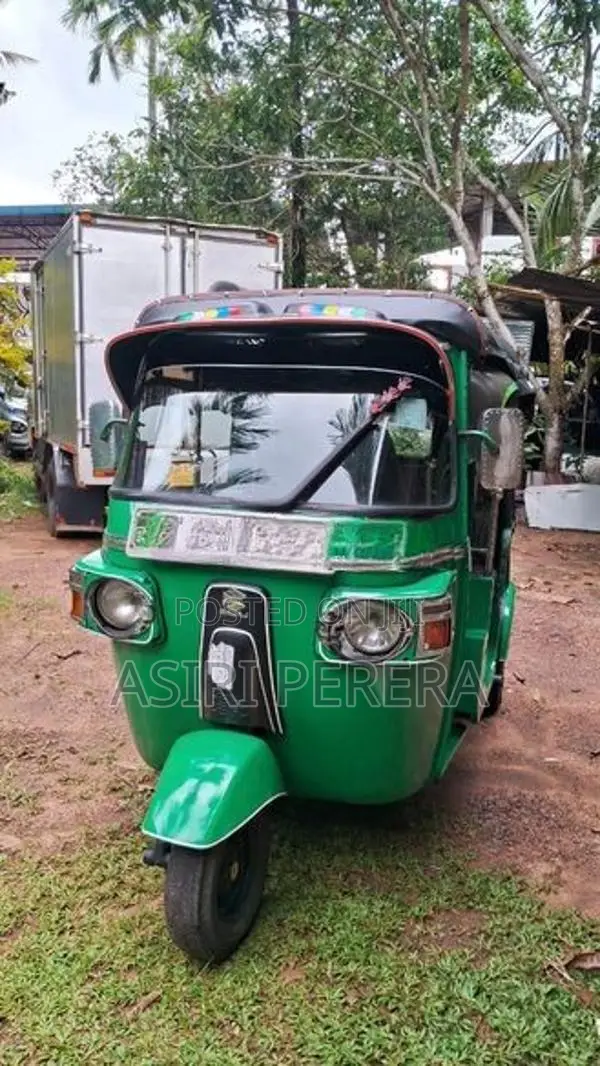 Bajaj RE 2013