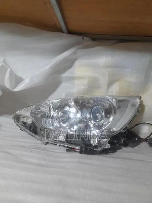 Toyota Aqua NHP10 LH Head Light - Reconditioned