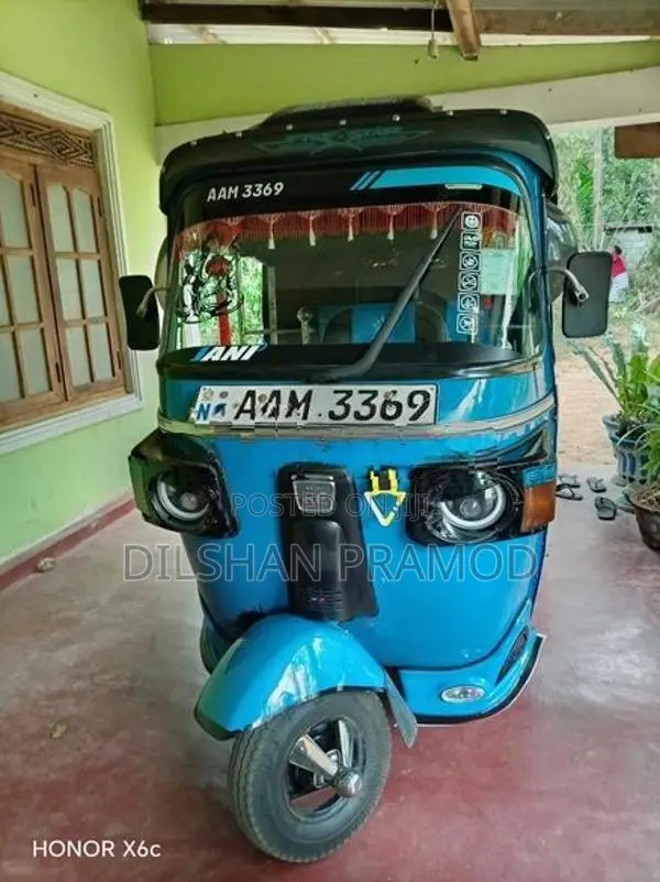 Bajaj RE 2013