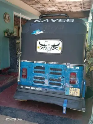 Bajaj RE 2013