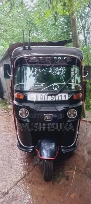 Bajaj RE 205 2014