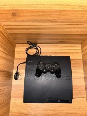 Sony PS3 Slim + Controller 5 Games