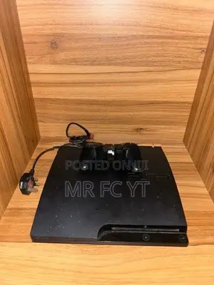 Sony PS3 Slim + Controller 5 Games