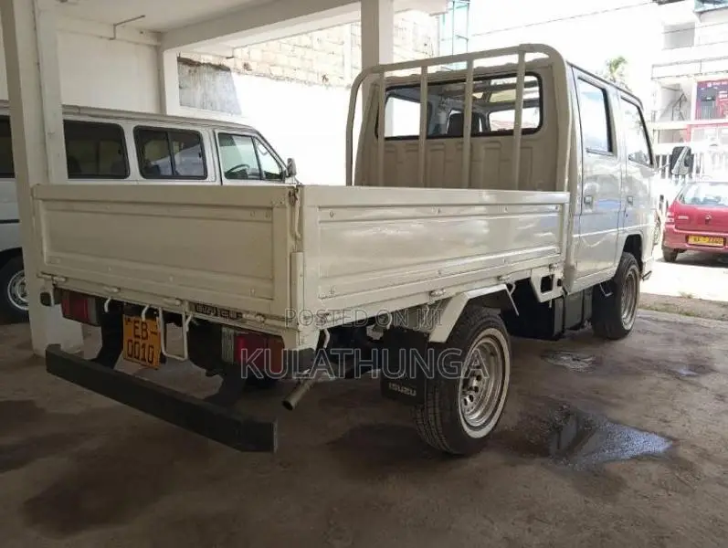 Isuzu ELF 1980 Crew Cab (Used)