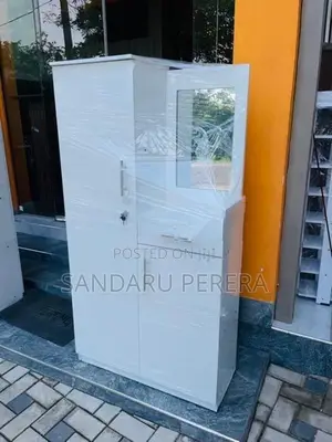 White melmaine baby cupboard
