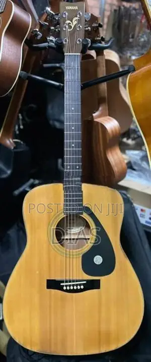 Yamaha Solid Acoustic Guitar/ Modal - FG 411 S
