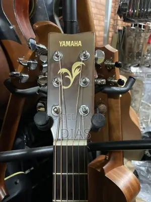 Yamaha Solid Acoustic Guitar/ Modal - FG 411 S