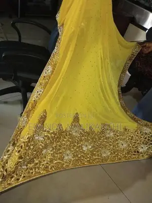 Yellow Chiffon Saree with Gold Border