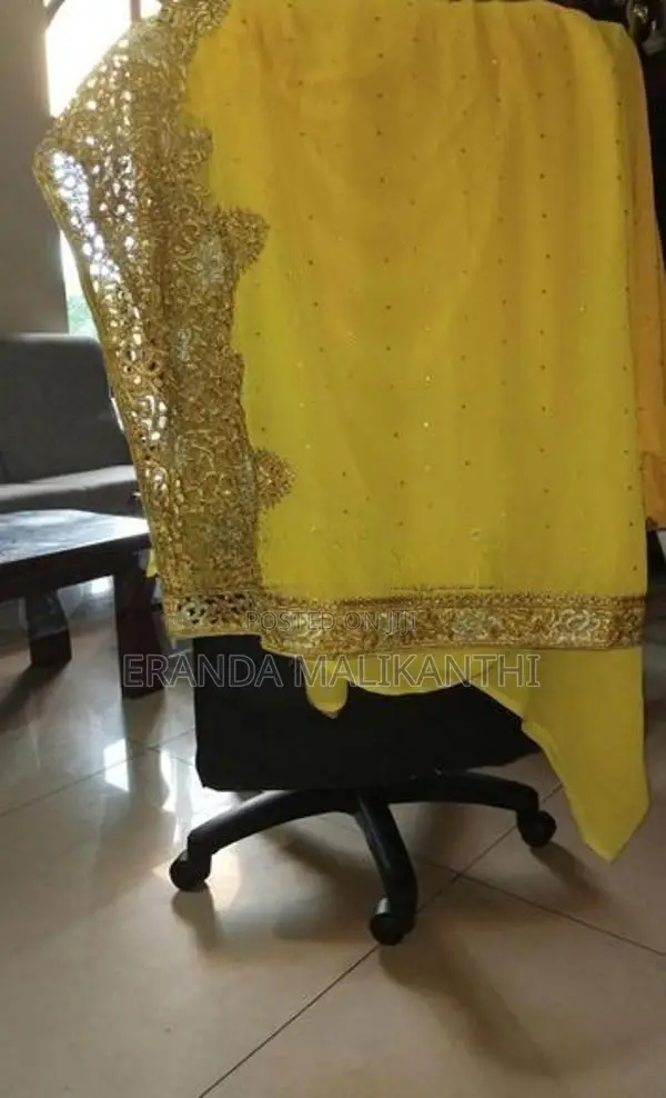 Yellow Chiffon Saree with Gold Border
