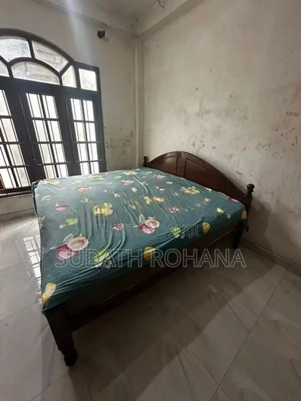Used Wooden Bed