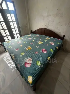Used Wooden Bed