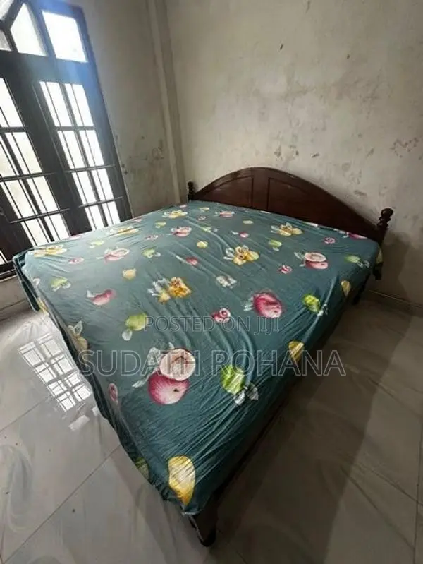 Used Wooden Bed