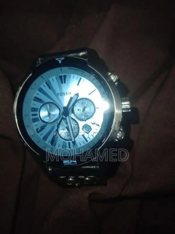 Fossil Coachman Chronograph (Model CH2564).