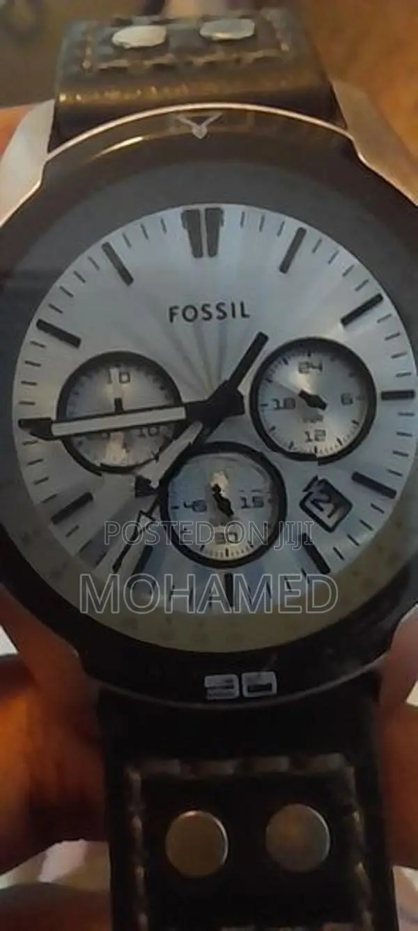 Fossil Coachman Chronograph (Model CH2564).