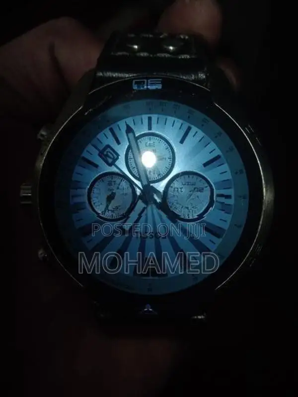 Fossil Coachman Chronograph (Model CH2564).
