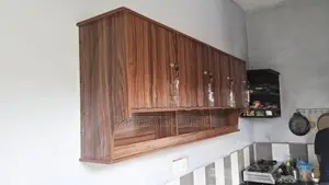Wall Top Melamine pantry cupboard .