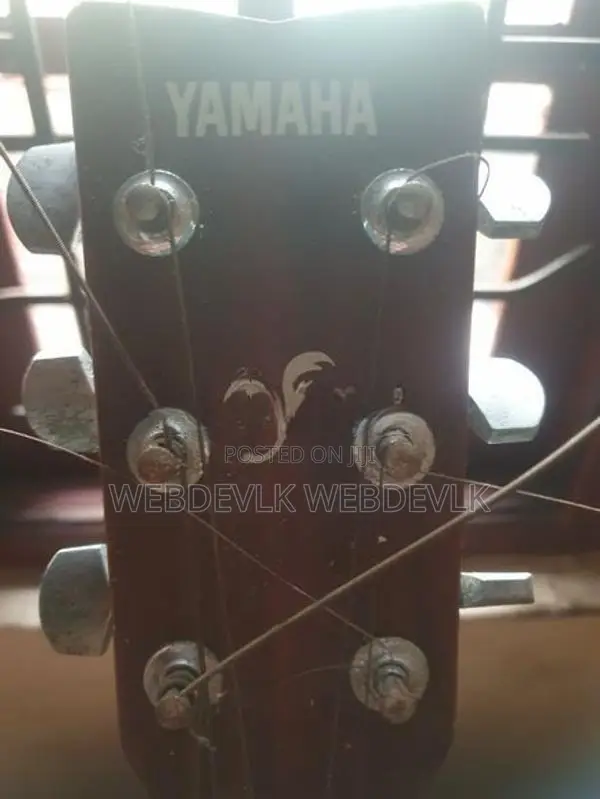 Yamaha F310 Dreadnought Acoustic Guitar