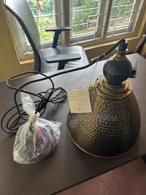 Transitional Pendant of Hammered Antique Brass