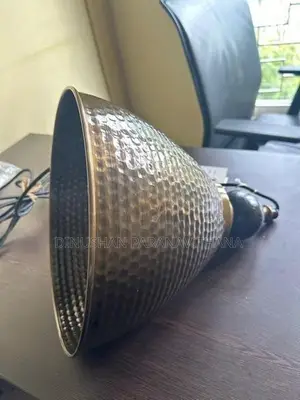 Transitional Pendant of Hammered Antique Brass