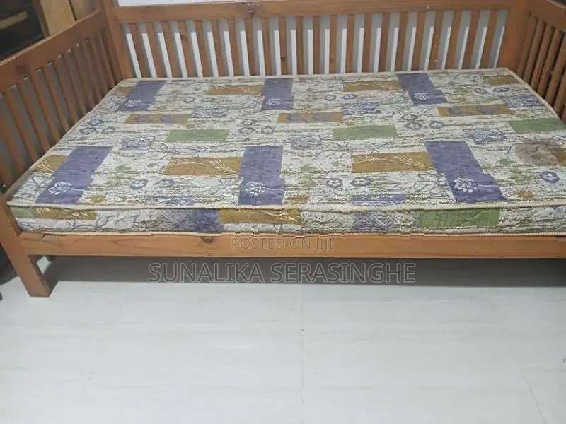 Bed with Damro Mettres