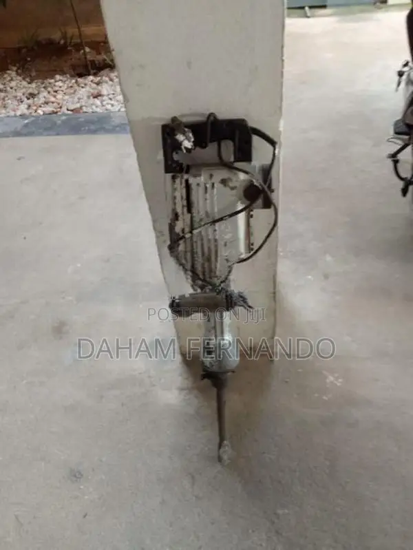 Hand-Held Pneumatic Rock Drill