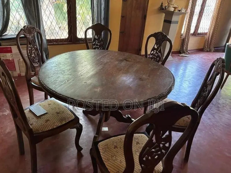 Used Round Teak Table With Six Upholstered Chairs