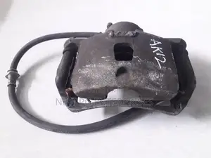 Nissan March AK12 Brake Caliper Front RHS
