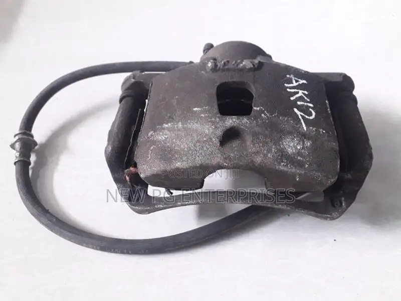 Nissan March AK12 Brake Caliper Front RHS