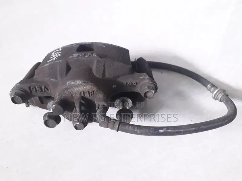 Nissan March AK12 Brake Caliper Front RHS