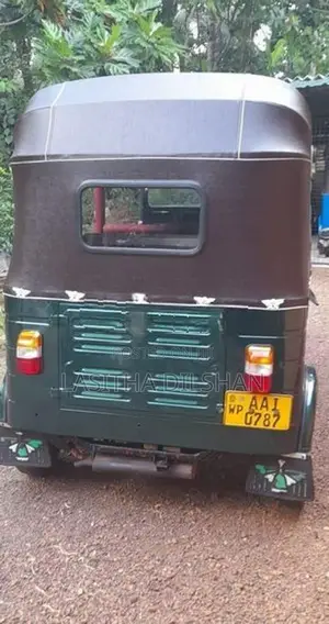 Bajaj RE 2013