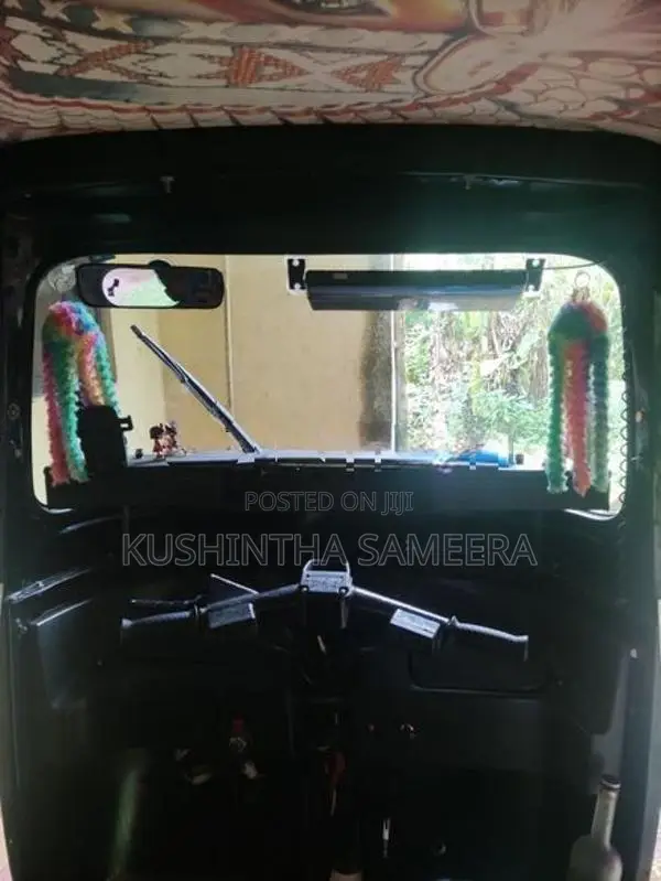 Bajaj RE 2011