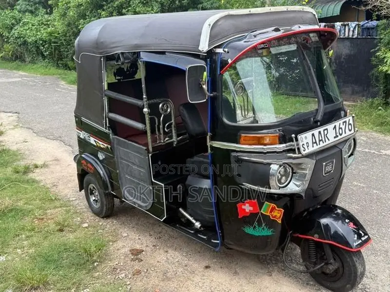 Bajaj RE 2014