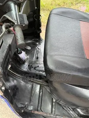 Bajaj RE 2014