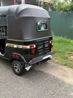 Bajaj RE 2014