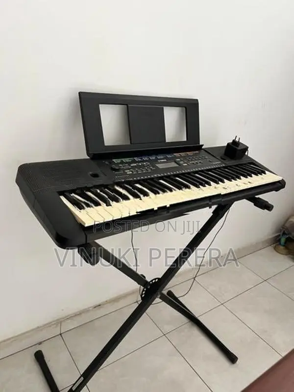 Yamaha PSR E253 Keyboard With The Stand