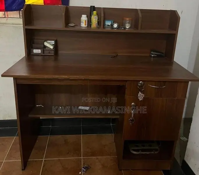Study Desk With An Overhead Shelving Unit.