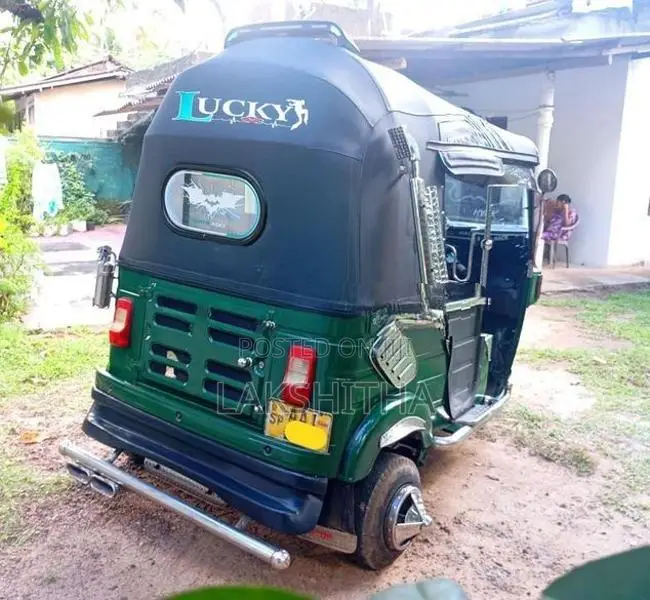 Bajaj RE 2013