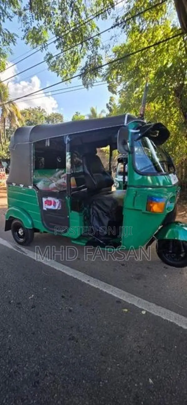 Bajaj RE 2013