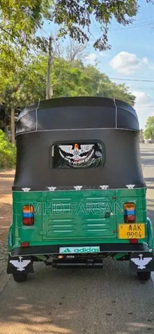 Bajaj RE 2013