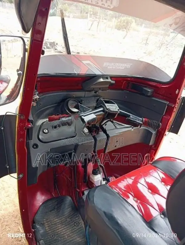 Bajaj RE 2014