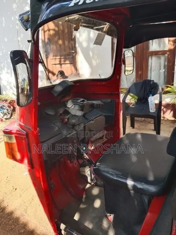 Bajaj RE 2013