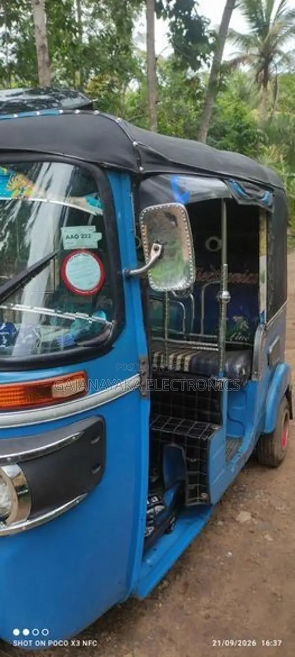 Bajaj RE 2014