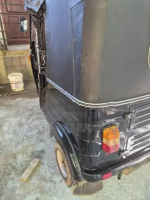Bajaj RE 2011