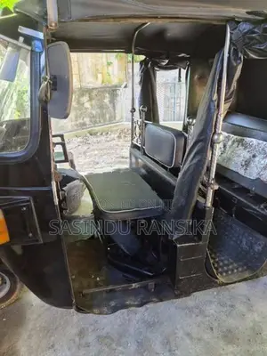 Bajaj RE 2011