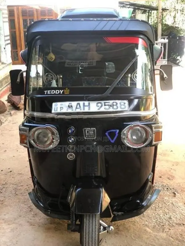Bajaj RE 2014